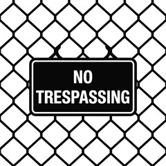 No trespassing sign on chain link fence