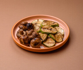 Grilled green zucchini slices, vegetarian food. Green barbecue zucchini