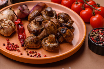 Grilled mushroom pieces, a vegetarian healthy meal with sauce. Barbecue mushroom halves