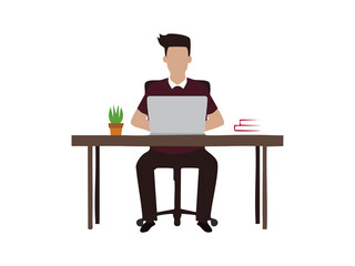 Silhouette of person sitting at desk with laptop