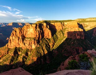 Majestic Canyon Panorama, Sunlit Cliffside & Shadow Play