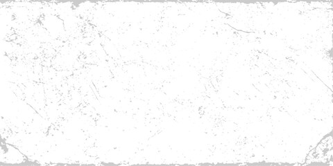 Vintage white grunge paper background with a rough textured surface and dirty paint pattern
