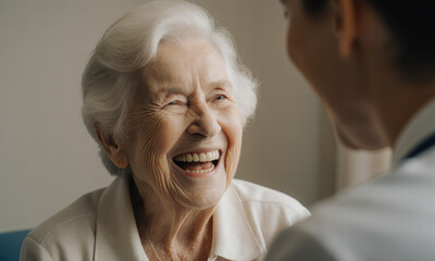 Joyful senior woman laughing heartily with a companion