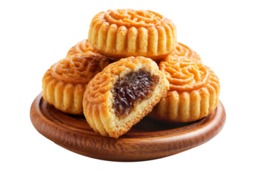 Traditional Maamoul cookies, one halved showing date and nut filling, isolated on white transparent background, concept of Arabic festive desserts