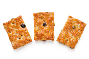 Three raisin cookies on a white background. Fresh puff biscuits with raisins
