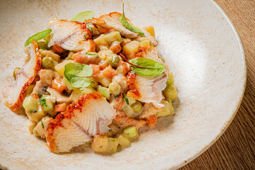 Enjoy crispy fish with vibrant seasonal vegetables for a perfect culinary delight