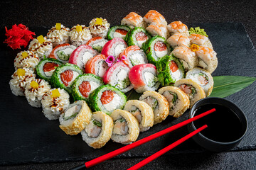 A colorful array of sushi rolls displayed beautifully on a platter