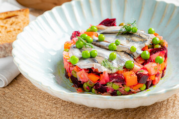 Fresh salad with vibrant veggies and fish, garnished with green peas, beautifully served