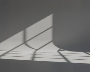 Abstract background featuring strong window shadows and geometric lines on a textured gray wall. High contrast creates a minimal, modern, and calm aesthetic, ideal for website backgrounds, product 