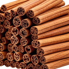 Cinnamon sticks stacked showing inner roll texture, tan and brown color