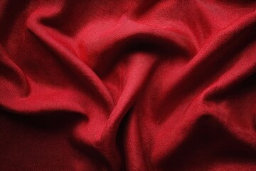 Obraz premium Rich red fabric drapes gracefully against a soft valentine's day background, perfect for romantic decor and aesthetic settings throughout the holiday