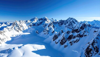 Snowy Mountain Range Vista Under a Clear Blue Sky in Winter Panorama of White Peaks and Ridges Against Azure Backdrop Aerial Perspective Stunning Winter Scenery