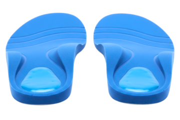 Pair of blue orthopedic shoe insoles with gel heel support isolated on a transparent background