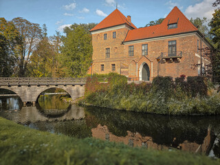 Fototapeta premium A brick Gothic castle in Oporow, Poland