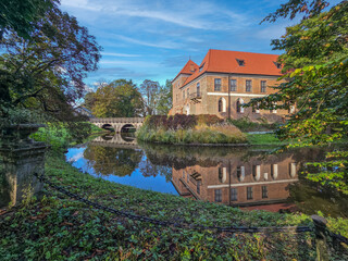 Obraz premium A brick Gothic castle in Oporow, Poland