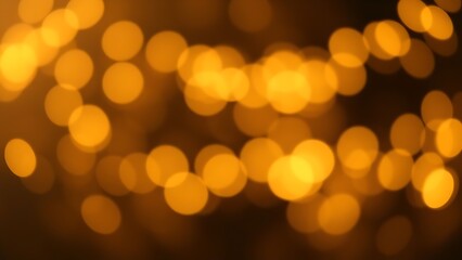 Fototapeta premium Golden bokeh light circles creating a dreamy and festive atmosphere with soft gradients.