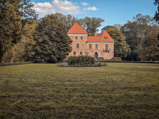 Obraz premium A brick Gothic castle in Oporow, Poland