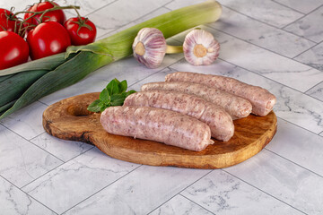 Raw pork sausages for grill