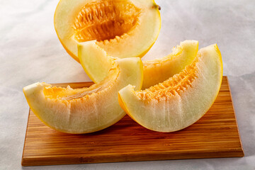 Ripe sweet juicy melon with slices