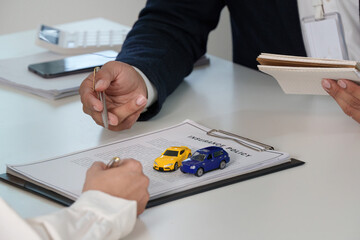 Auto Insurance Policy Discussion with Model Cars