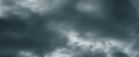 Fototapeta premium Dramatic storm fluffy cloud sky. Rainy season. Cloudscape background. Pollution, PM 2.5, Carbon dioxide and environment problems concept. Halloween, scary scene thunderstorm and rainy season backdrop.