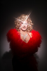 Glamorous Drag Queen Shines With Star-Shaped Light Streak in Stunning Portrait