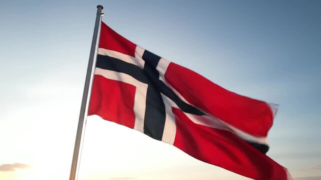 The National Flag of Norway Waving Gracefully in the Wind. - Powered by Adobe