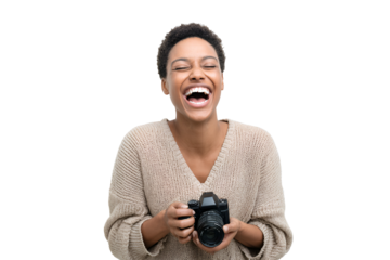 Cheerful female photographer with camera expresses pure happiness and delight with her creative art in portrait photography studio joyful expression of professional success