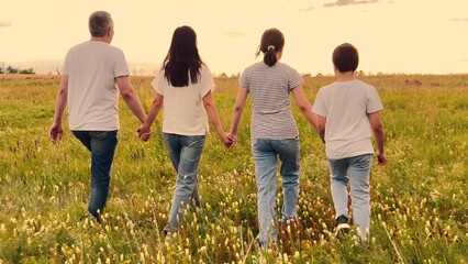 child parent, mother, father nature holding hand, happy family dream, Peaceful family sunset, Fields of gold and smiles, Childhood and family ties, Family time in nature, Trust through holding hands