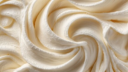 Close up of creamy whipped frosting texture with swirling peaks sweet dessert
