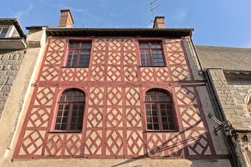 Sunny facade of a timber framing house in Rennes, France 
