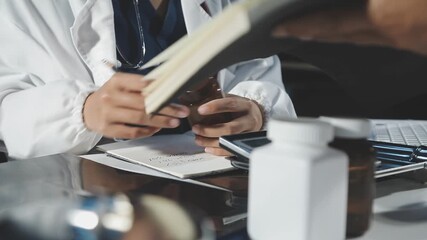 Medical professionals in scrubs discussing patient care, analyzing data on a clipboard in a meeting, Diagnosis and treatment planning. - Powered by Adobe