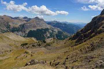 Rugged mountain landscape under a bright blue sky