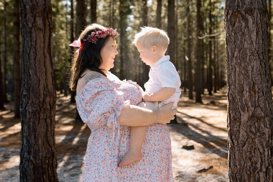 Family Maternity Photos in a Forest