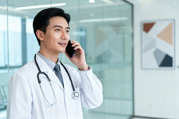Doctor talking on phone in clinic