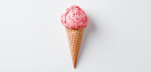 A single scoop of pink ice cream in a waffle cone on a plain white background studio shot top view
