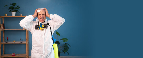 shocked Elderly pest control worker looking at the camera in surprise inside infested house....