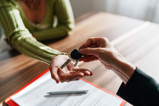 Key handover during apartment viewing with real estate agent