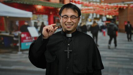 Priest holding a ring in an urban city street setting, implying proposal or marriage, featuring a...