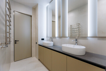 This is a Modern Minimalist Bathroom Interior featuring Stylish Fixtures and Accessories