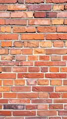Obraz premium A detailed view captures the timeless texture and rich hues of a weathered brick wall, embodying strength, durability, and the beauty of aged craftsmanship.
