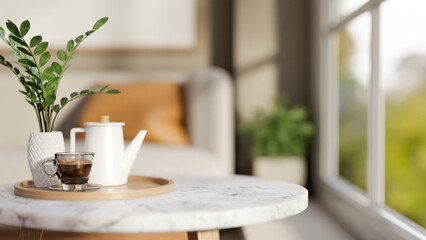 Teapot and glass cup with plant on wooden tray over round marble table across sofa in living room.