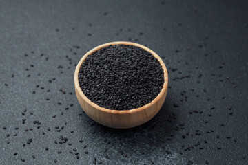 Sesame seeds in a wooden bowl