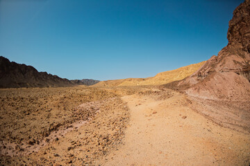 View of rocky landscape in the desert of Israel, sandstone cliffs and desert. Israel. Eilat.