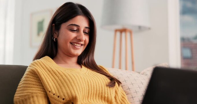 Online, freelancer and woman with laptop, lounge and proofreading article on website and journalism. Remote work, creative and person with tech for story, reporter and editing draft on couch in home