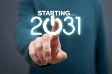 A person pointing at a glowing starting 2031 graphic with a power button in the place of the zero