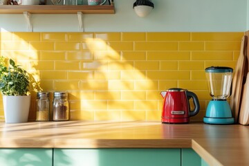 Modern kitchen with yellow tiles, red blender, blue kettle
