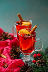 Warm winter mulled wine drink with orange slices cinnamon and star anise spice © reddish