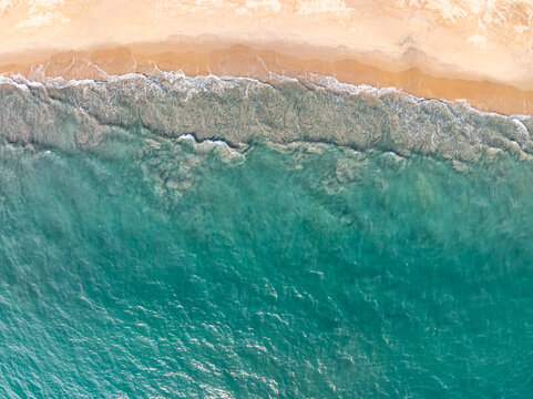 Fototapeta Aerial top view sea waves surface nature background
