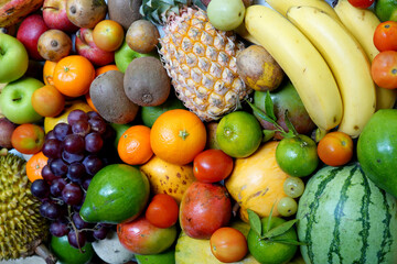 Fresh colorful exotic fruits background for banner.